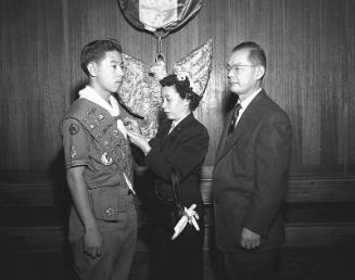 [Koyasan Boy Scout Troop 379 initiates Eagle Scouts at Court of Honor at Koyasan Buddhist Temple, Los Angeles, California, December 10, 1954]