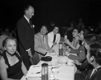 [JACL officials and members of Gene Parker's Nisei Dance Club at Moulin Rouge, December 16, 1954]