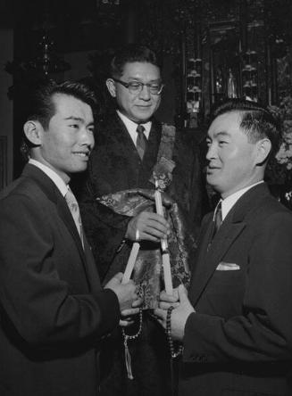 [Installation ceremony of Nishi Hongwanji Young Buddhist Association president and vice-president by Reverend Kenryo Kumata, Los Angeles, California, January 16, 1955]