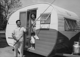 [James Higashida, second place winner of San Diego Yellowtail Derby, with recreation trailer home, Van Nuys California, May 19, 1955]