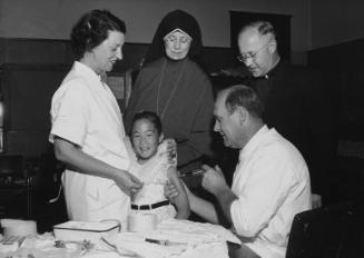 [Children given polio vaccine at Maryknoll School, Los Angeles, California, May 19, 1955]