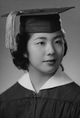 [May Iwamoto in cap and gown, head and shoulder portrait, Los Angeles, California, May 25, 1955]