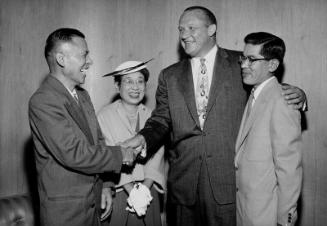 [Mr. and Mrs. Kyujii Hozaki meet Senator Knowland at Press Club dinner at Ambassador Hotel, Los Angeles, California, August 25, 1955]
