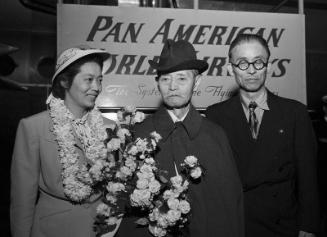 [Yukio Ozaki arriving with daughter at Pan American runway at Los Angeles International Airport, Los Angeles, California, May 16, 1950]