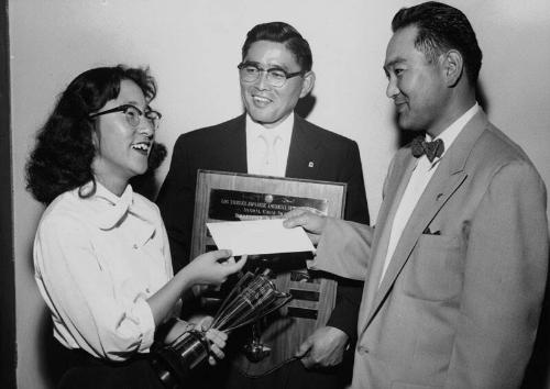 [Japanese American Optimist Club of Los Angeles award presentation at Roosevelt High School, Los Angeles, California, June 9, 1956]