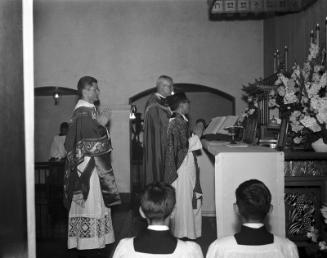 [Father Bryce T. Nishimura officiating first Solemn High Mass at Maryknoll Church, Los Angeles, California, July 2, 1956]