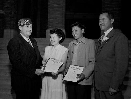 [Henry Yamada and Jane Masamura of Stevenson Junior High School receiving American Legion Award, California, June 15, 1950]