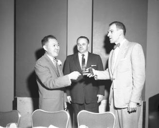 [Installation of George Izumi of Grace Pastry Shoppe as president of Master Bakers Retailers Association at Statler Hotel, Los Angeles, California, December 8, 1956]