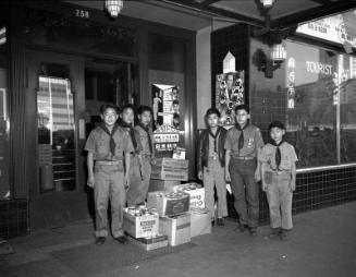 [Boy Scout Troop #379 donation to downtown JACL Christmas Cheer program, Los Angeles, California, December 15, 1956]