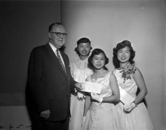 [Three young women receiving Bank of America award, 1956]