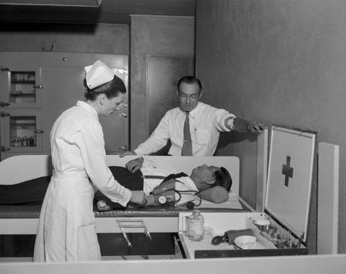 [Reverend Bumpo Kuwatsuki and Senshin group promoting the Senshin Blood Insurance program at Red Cross, Los Angeles, California, March 29, 1957]