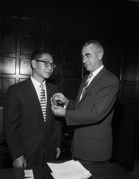 [Ronald Kobayashi and Fire Chief William L. Miller observing Boy's Week in Government, Los Angeles, California, April 30, 1957]