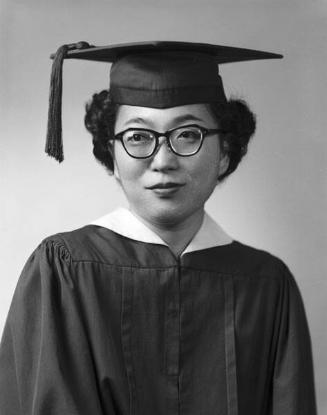 [Doris Yokoyama in cap and gown, half-portrait, Los Angeles, California, June 11, 1957]