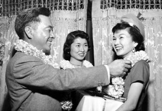 ["1958 Miss Spirit of the New Year" at annual Nisei Veterans Association New Years eve dance at Biltmore Hotel, Los Angeles, California, December 31, 1957]