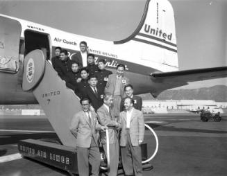 [Arrival of Japanese wrestling team at airport in California, February 1955]