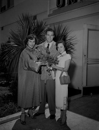 [Florence Marley and Yoshiko Yamaguchi at Los Angeles International Airport (LAX), Los Angeles, California, July 21, 1950]