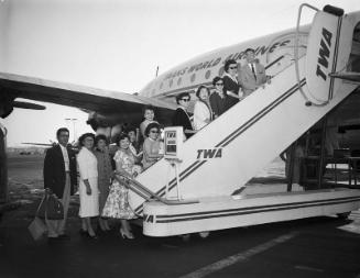 [Young Buddhist Association departing for Hawaii Territorial Young Buddhist League Conference at Los Angeles International Airport, Los Angeles, California, August 12, 1955]