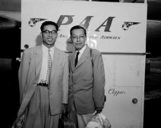 [Mr. Suzuki and Mr. Nagata in front of Pan American Airways airplane at airport, Los Angeles, California, August 12, 1955]