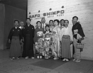 [Manzai group from Japan in front of Rafu Shimpo, Los Angeles, California, September 1, 1955]