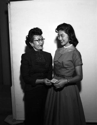 [Mrs. Ito presents Stella Nakadate with a card, California, September 7, 1955]