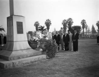 [Mr. Okusa of Japan visiting World War II Nisei memorial at Evergreen cemetery, Los Angeles, California, November 6, 1955]