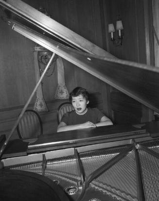[Miss Maria Miyamoto of San Francisco at grand piano, California, November 23, 1955]