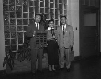[Dorothy Yamada of Roosevelt High School receiving outstanding senior award from Japanese American Optimist Club, Los Angeles, California, January 28, 1958]