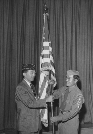 [Commodore Perry Post 525 of the American Legion presenting American flag to Boy Scout troop 98 at Commonwealth Avenue School, Los Angeles, California, October 10, 1958]