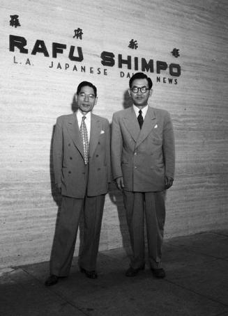 [Mr. Miki and Ikken Momii in front of Rafu Shimpo, Los Angeles, California, October 6, 1950]