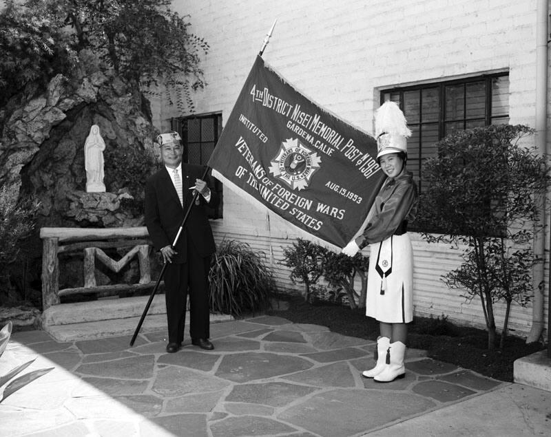 [Fourth District Nisei Memorial Post 1961, Veterans of Foreign Wars, presenting banner to Maryknoll All Girls drum and bugle corps, Los Angeles, California, August 30, 1959]