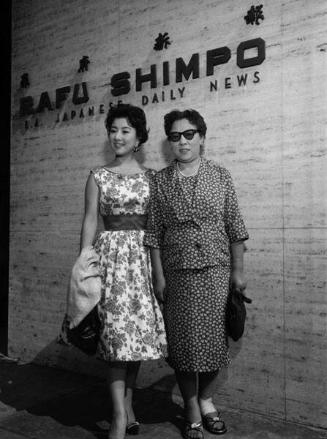 [Miss Fujiko Yamamoto from Japan in front of Rafu Shimpo office, Los Angeles, California, October 1959]