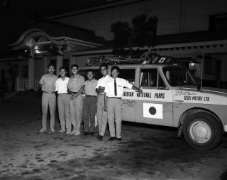 [Young men and automobile in front of Koyasan Buddhist Temple, Los Angeles, California, October 13, 1962]