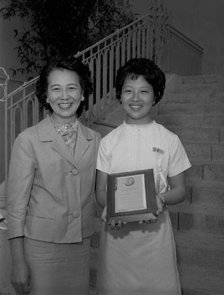 [Kathie Miyake, Carver award plaque recipient, at Carver Junior High School, Los Angeles, California, June 21, 1963]