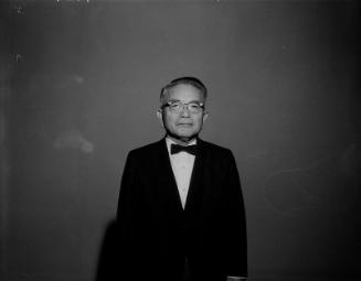 [Mr. Kubota in dark suit and eyeglasses, half-portrait, California, ca. 1950-1964]