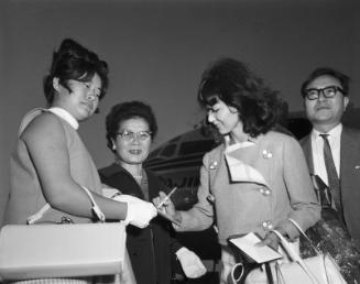 [Keiko Kishi arriving at airport, California, April 1966]