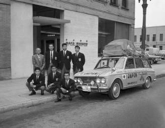 [Japanese car to caravan North and South America in front of Rafu Shimpo building, Los Angeles, California, August 3, 1966]