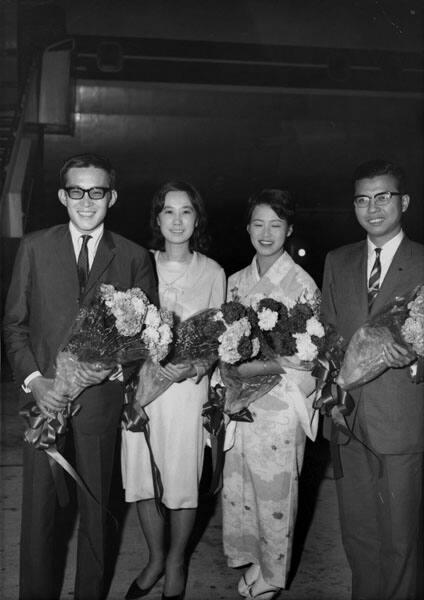 [Group of men and women arriving at airport, California, 1966?]