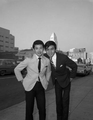 [Two Japanese singers, Koichi Fujimoto and Teruhiko Saigo, in front of Rafu Shimpo, Los Angeles, California, January 20, 1967]