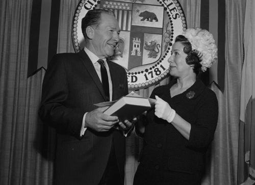 [Book presentation to Los Angeles Mayor Sam Yorty in City Hall, Los Angeles, California, April 12, 1967]