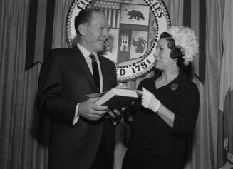 [Book presentation to Los Angeles Mayor Sam Yorty in City Hall, Los Angeles, California, April 12, 1967]