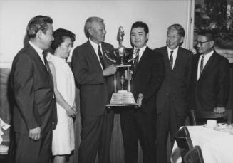 [Oliver trophy award presentation to Martin Nakazawa, outstanding athlete at Rudi's restaurant, Los Angeles, California, October 8, 1967]