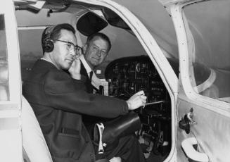 [Kenji Ito taking pilot license test with Piper Cherokee 140 airplane, California, February 11, 1967]