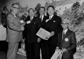 [Sister City delegation from Japan receiving proclamation from Huntington Park Rotary Club, California, January 29, 1968]