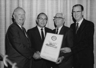 [Los Angeles Supervisors Ernest E. Debs, Burton W. Chace and Kenneth Hahn presenting proclamation to Consul General of Japan, Toshiro Shimanouchi, Los Angeles, California, July 9, 1968]