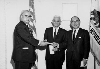 [Mita Kai check presentation to Fred Wada and Takita Yamaguma, California, February 27, 1969]