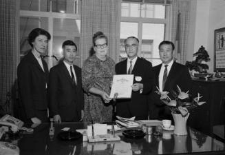 [Goodwill message and certificate exchange between Los Angeles and Aoyama Gakuin Orchestra from Japan at Los Angeles City Hall, Los Angeles, California, March 4, 1969]