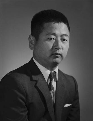[Man in suit, half-portrait, Los Angeles, California, August 26, 1969]