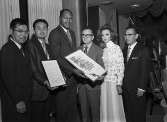 [JUST Testimonial dinner for Dr. Thomas T. Noguchi and defense team, Godfrey and Rowena Isaac, at Biltmore Hotel, Los Angeles, California, August 28, 1969]