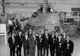 [Delegates of the Tenth Biennial Japanese-American  Conference of Mayors and Chamber of Conference tour Apollo 11 capsule at North American Rockwell Corporation, Downey, California, October 22, 1969]