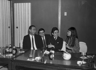 [Takashi Hoga, producer of Hitokiri, and actress Izumi Yukimura at Kawafuku restaurant, Los Angeles, California, January 29, 1970]